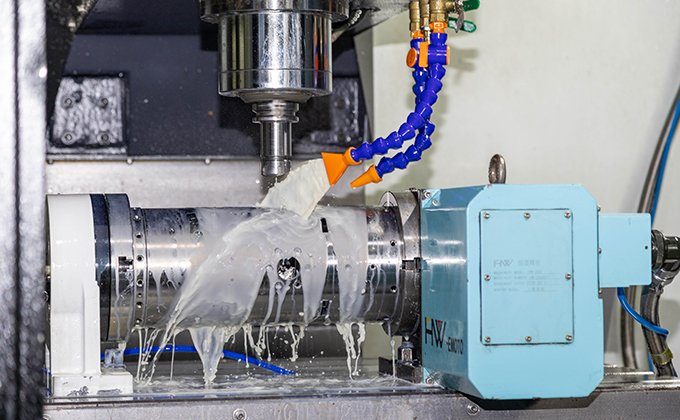 Four-axis CNC machining center